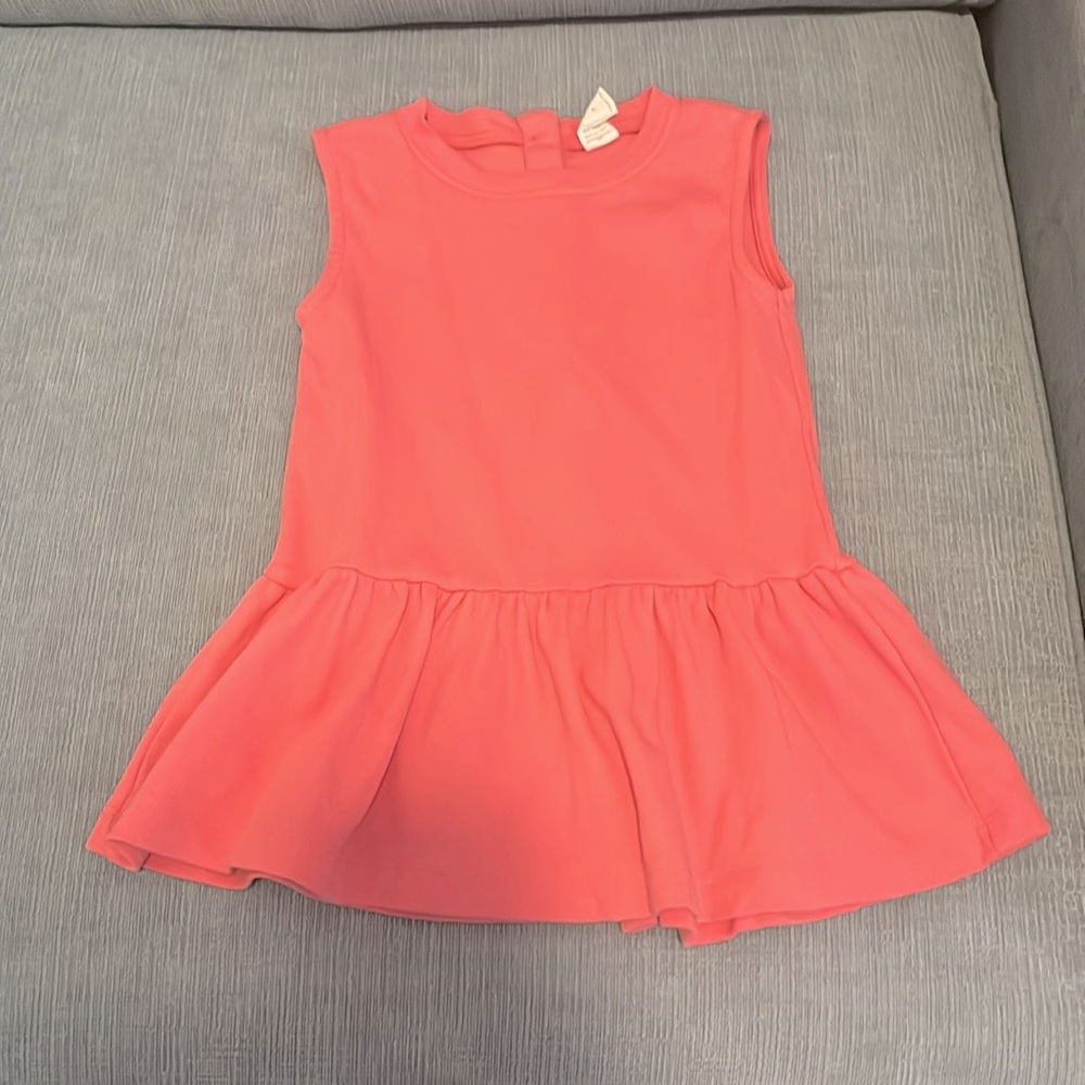 Kate Quinn Peplum Top with Buttons in the Back